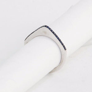 These incredibly unique rings from the 1970s are made of 18K gold and feature a sleek silhouette with a point on the top. They are available either solid gold or encrusted in sapphires. These can be worn on their own, as a set or add one to your existing stack for even more drama. These are a true statement piece! White gold and sapphire view