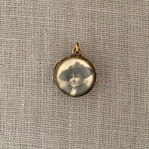 Pool of Light Antique Locket, front view. Portrait locket that holds photos and pictures