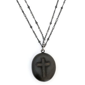 Gutta Percha cross antique locket on antique gunmetal fancy link watch chain, front view