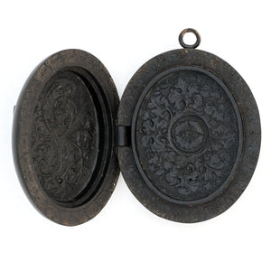 Gutta Percha cross antique locket, open view, shows intricate carvings, beautiful black locket