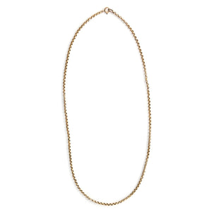 This Victorian belcher (round cable) chain is made of a rich, buttery 14K gold and features a spring ring clasp. A wonderfully wearable length of 28" makes it a terrific layering piece.  Paired with one of our antique gold lockets or worn on its own, this classic necklace will stand the test of time. Full chain view