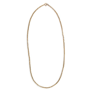 This Victorian belcher (round cable) chain is made of a rich, buttery 14K gold and features a spring ring clasp. A wonderfully wearable length of 28" makes it a terrific layering piece. Paired with one of our antique gold lockets or worn on its own, this classic necklace will stand the test of time. Full chain view