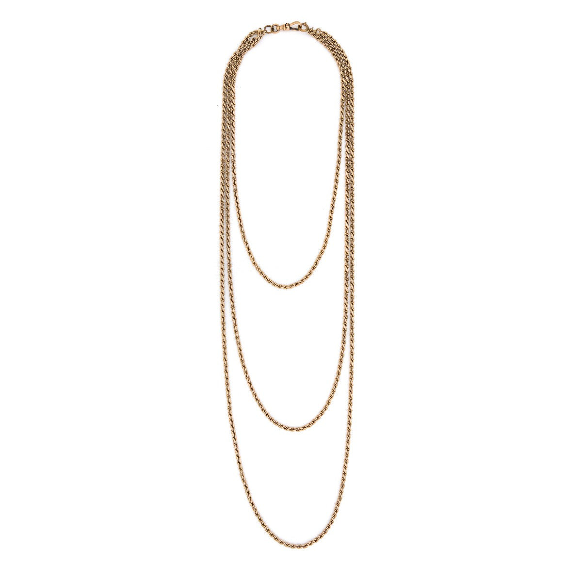 This 12K gold fill antique rope chain features three gorgeous strands of varying lengths (18", 27" and 34")  which meet together at the back with a hefty watch chain hook. Wear this striking piece alone or layered with your favorite pieces for a bold statement. Close up view, showing clasp