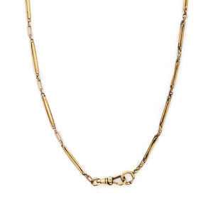 This substantial gold fill antique bar link watch chain features two complimentary 14" watch chains connected to make the perfect 28" piece. This versatile chain can be worn alone, with charms or a locket, or layered with other chains for a bold statement. Close up view