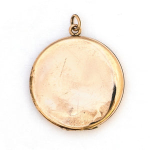 This large round locket features a pearl encrusted crescent moon and a starburst with a 4 mm opal at the center. It opens to hold two photos and pairs perfectly with one of our antique gold fill chains. Back Locket view