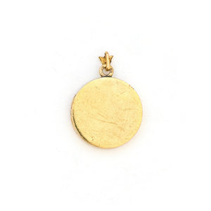 This petite 14K gold round locket features a whimsical floral design encrusted with 8 diamonds and a pear shaped ruby. It opens to hold two photos, includes one original frame and pairs perfectly with one of our antique 14K gold chains. Back Locket View