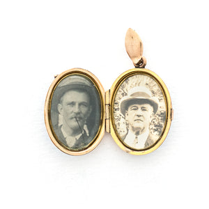 This absolutely gorgeous robin egg blue enamel and gold fill locket is oval shaped and features a sparrow carrying a scroll in it's beak. The sparrow is surrounded by an intricate golden wreath. It opens to hold two photos, includes both original frames and glass, and pairs perfectly with one of our antique gold fill chains. Open locket view