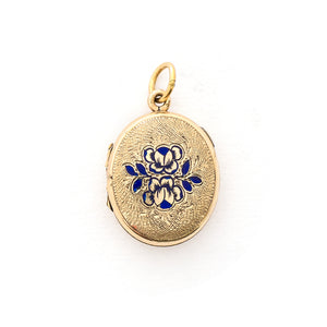 This sweet oval locket features a delicate rose design with navy blue enamel set on a finely textured background. The initials BBG are inscribed on the back. It opens to hold two photos, includes one original frame and glass and pairs perfectly with one of our antique gold fill chains. Front locket view
