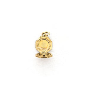 This petite octagonal locket features a delicately etched floral motif including a classic Victorian era symbol, the forget-me-not flower at the top of the design. It opens to hold two (very tiny!) photos and pairs perfectly with one of our antique gold fill chains. Open Locket View