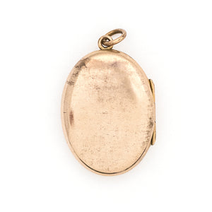 This unique oval Victorian locket features blue and red stones and seed pearls set within a finely etched bug design. It opens to hold one photo, and pairs perfectly with one of our antique gold fill chains. This unique oval Victorian locket features blue and red stones and seed pearls set within a finely etched bug design. It opens to hold one photo, and pairs perfectly with one of our antique gold fill chains. Back locket view