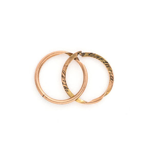 This rare 9K gold split ring breaks apart to reveal a secret message from the past inside. It can be worn as a ring, or is ideal to hang a group of charms or fobs from. The names "Gaetana" and "Vito" and the date "23-4-1922" are lovingly inscribed inside. A unique treasure for any collection! Open ring view