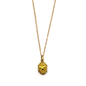 Tiny Oval Garnet Locket