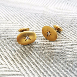These antique solid 14k gold and old mine cut diamond star cufflinks had us at Hello. They'd make a pretty amazing gift for a dapper dad, a groom on his wedding day, or a lady who can rock shirtsleeves.
