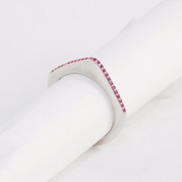 These incredibly unique rings from the 1970s are made of 18K gold and feature a sleek silhouette with a point on the top. They are available either solid gold or encrusted in sapphires. These can be worn on their own, as a set or add one to your existing stack for even more drama. These are a true statement piece! White gold pink sapphire ring