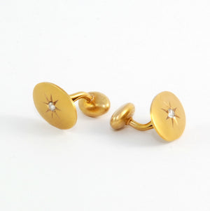 These antique solid 14k gold and old mine cut diamond star cufflinks had us at Hello. They'd make a pretty amazing gift for a dapper dad, a groom on his wedding day, or a lady who can rock shirtsleeves. Front cufflink view