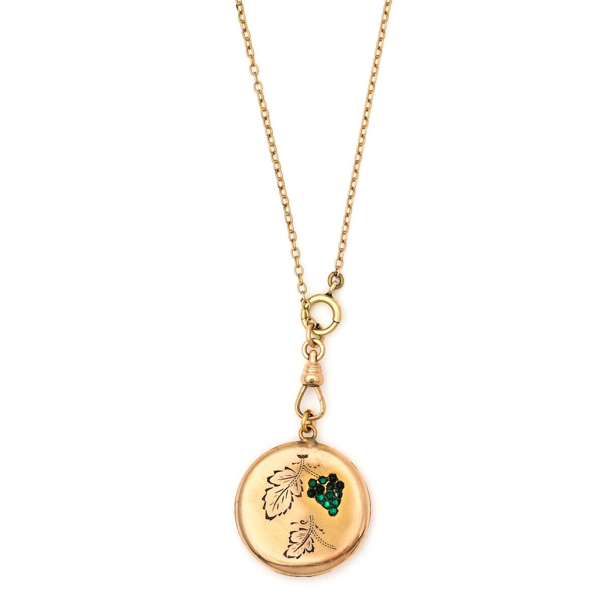 Green Grapes Antique locket, gold fill locket with green stones, opens to hold pictures and photos, front view, shown on antique gold fill watch chain