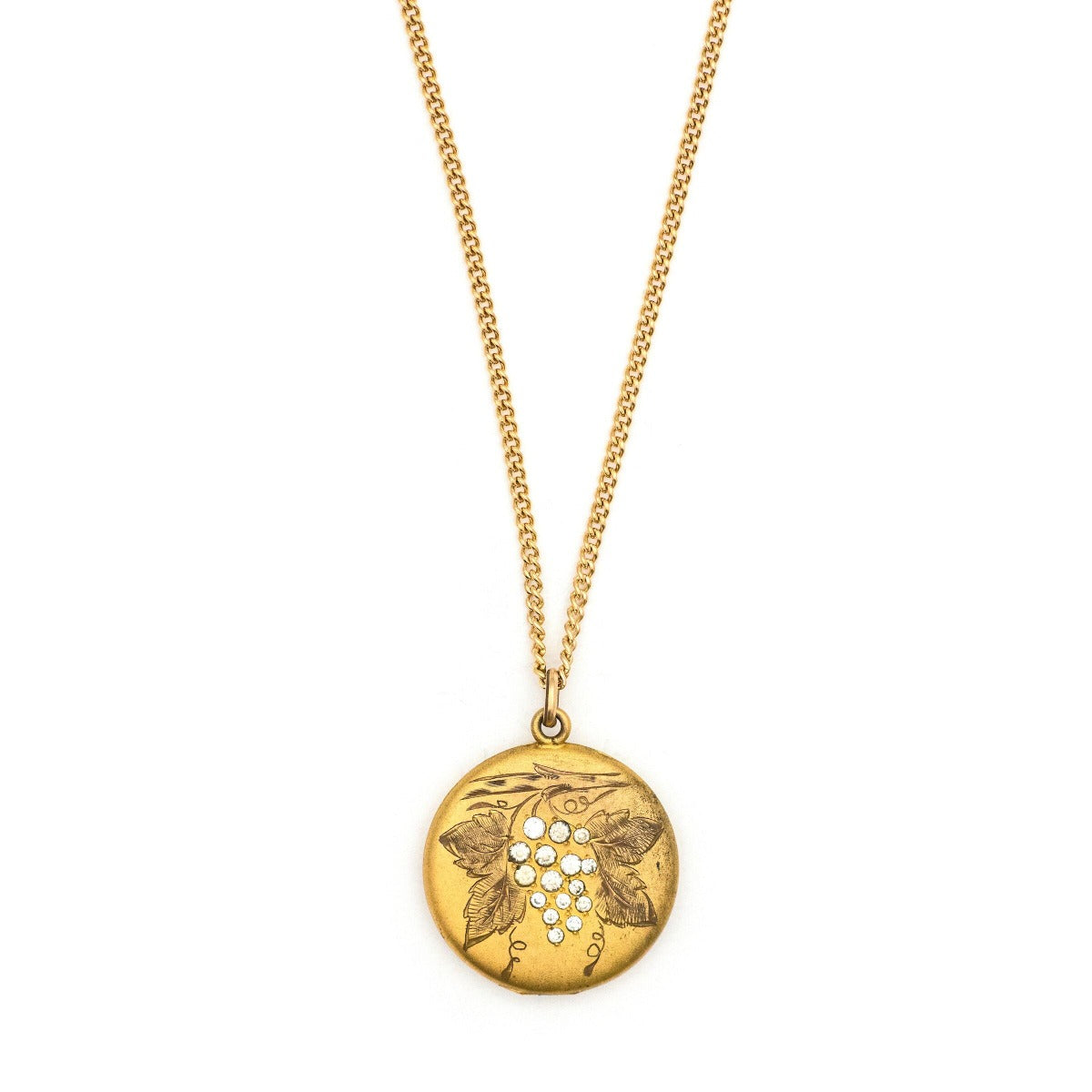 On the Vine Antique Locket, gold fill locket with grapes, leaves and a branch, with Victorian white paste stones, holds photos and pictures, front view, shown on an antique gold fill chain