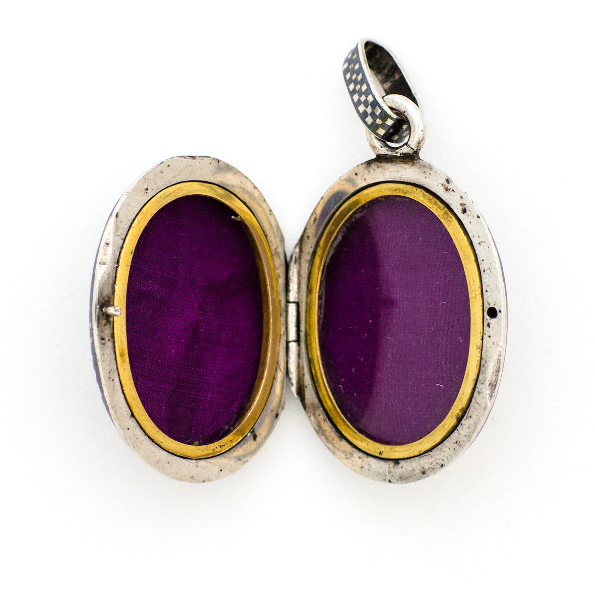 Checkered Oval Niello Antique Locket, black and white checker board locket, for holding pictures and photos, open locket view, shows beautiful purple lining fabric