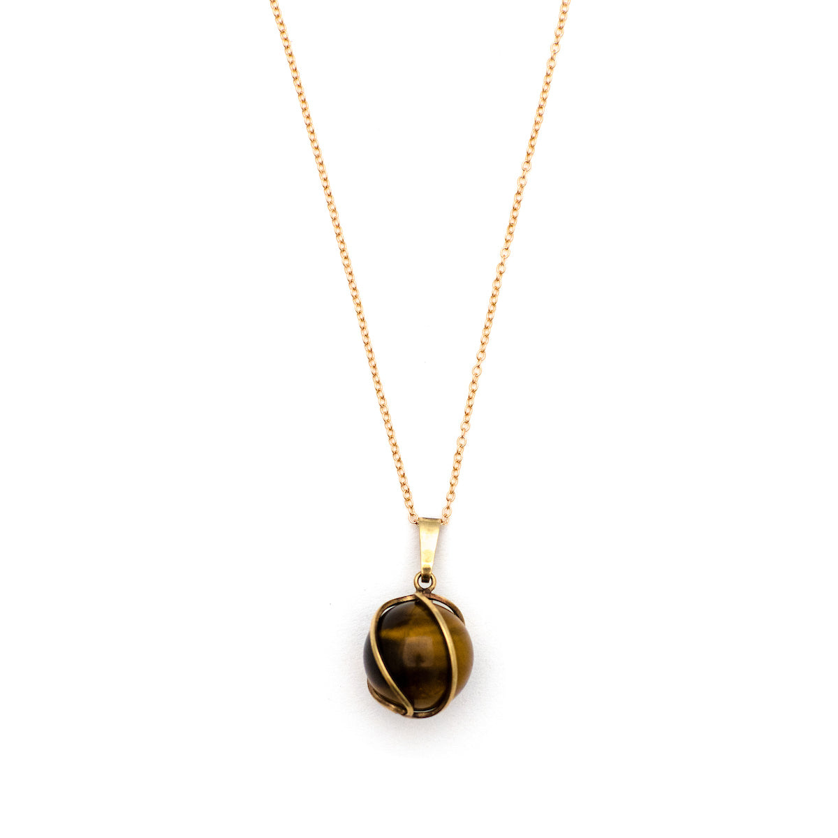 This dynamic charm is made of cymophane, more commonly known as Cat's Eye and is encased in a 8K gold setting. Cat's Eye is believed to help ward off evil and also acts as a talisman to protect against unforeseen danger. Paired with one of our new 14k gold chains, this is the ultimate good luck charm. Front charm view