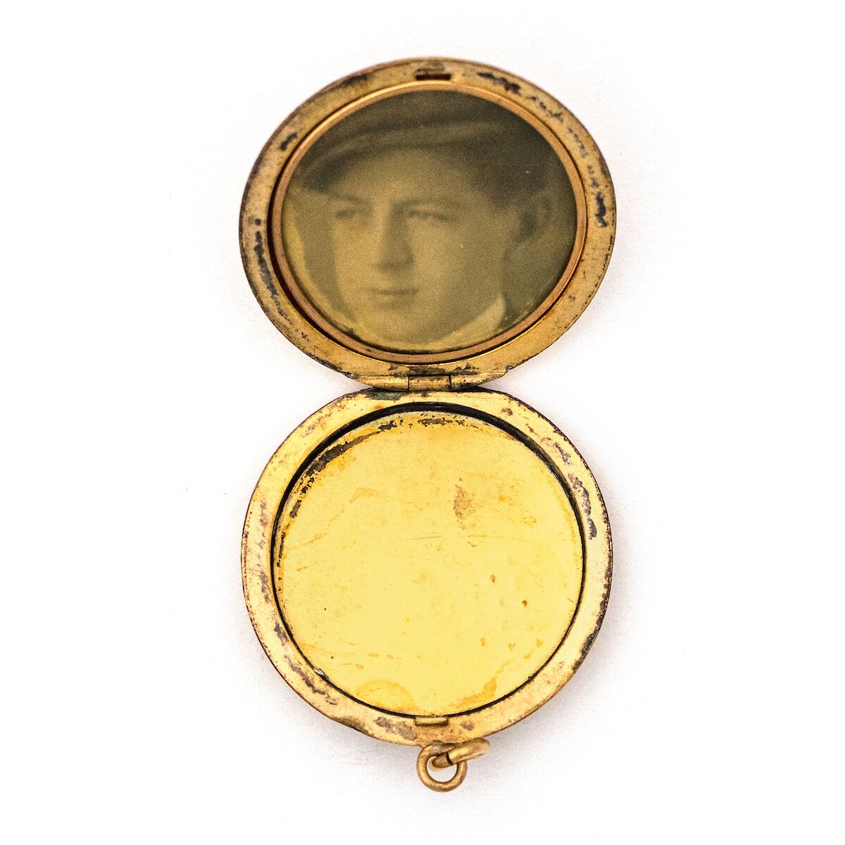 Green Grapes Antique locket, gold fill locket with green stones, opens to hold pictures and photos, open locket view, shows original frame to hold pictures and photos