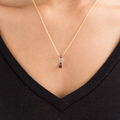 In the Victorian era, these tiny 14K rings were baby rings.  They are beautiful examples of classic Victorian styling featuring genuine stones in a starburst setting. Wear them on one of our antique gold chains as a necklace or off as a pinky or midi ring. Shown on necklace