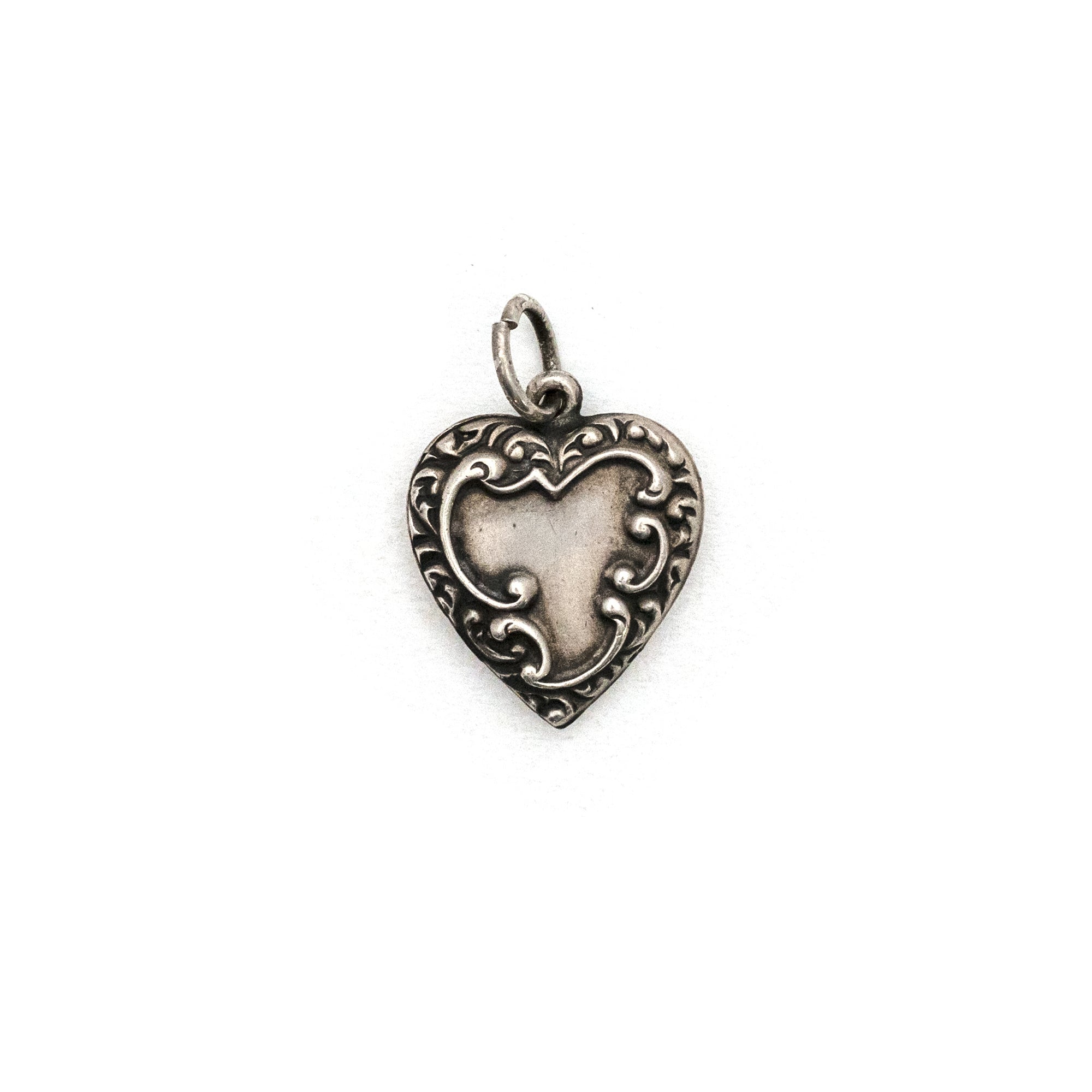 Antique Sterling Silver Swirling Heart Charm