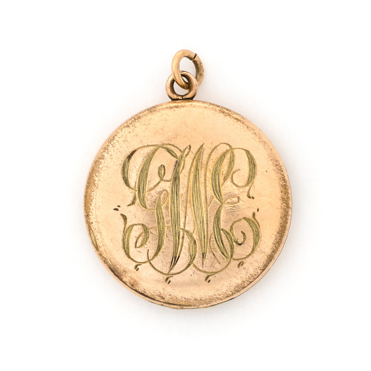 Antique Sweetheart Locket, sweet gold fill locket with white paste stones in the shape of a heart. Perfect for holding pictures and photos, back locket view showing monogrammed inscription G N E