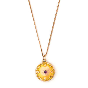 14K Gold & Ruby Starburst Antique Locket on a 10K gold antique curb chain, front view