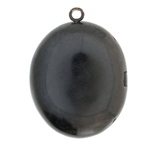 Gutta Percha cross antique locket, back view, black locket