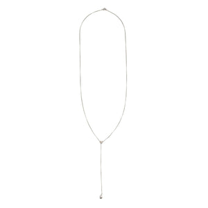 This art deco lorgnette chain measures 24" in length with a 4.5" extension. It features an extremely delicate curb link and an ornamental triangle at the base of the extension. In the Victorian era, lorgnettes carried eyeglasses, but we think it pairs beautifully with one of our vintage lockets or charms. Full chain view