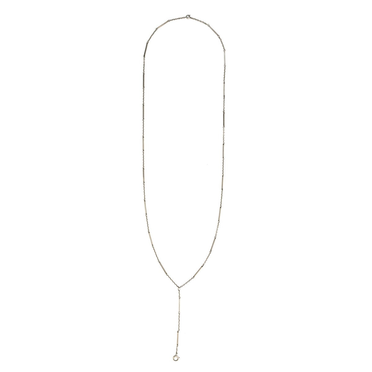 This elegant Victorian lariat chain is crafted in solid 10K white gold and with finely striped bar links alternating with a fine round cable chain. It is 28" in length with a 3.5" extension. It is crafted classic Victorian lariat chain pairs beautifully with one of our vintage lockets or charms. Full chain view