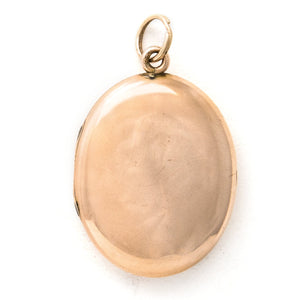Oval horseshoe antique locket back view, gold fill and paste stone locket