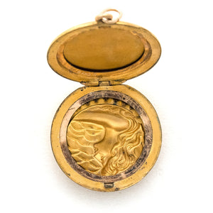Tidal Goddess Antique Locket, gold fill locket with white paste stone crescent moon and woman in profile with waves, perfect for holding pictures and photos, open locket view, shows original locket frames