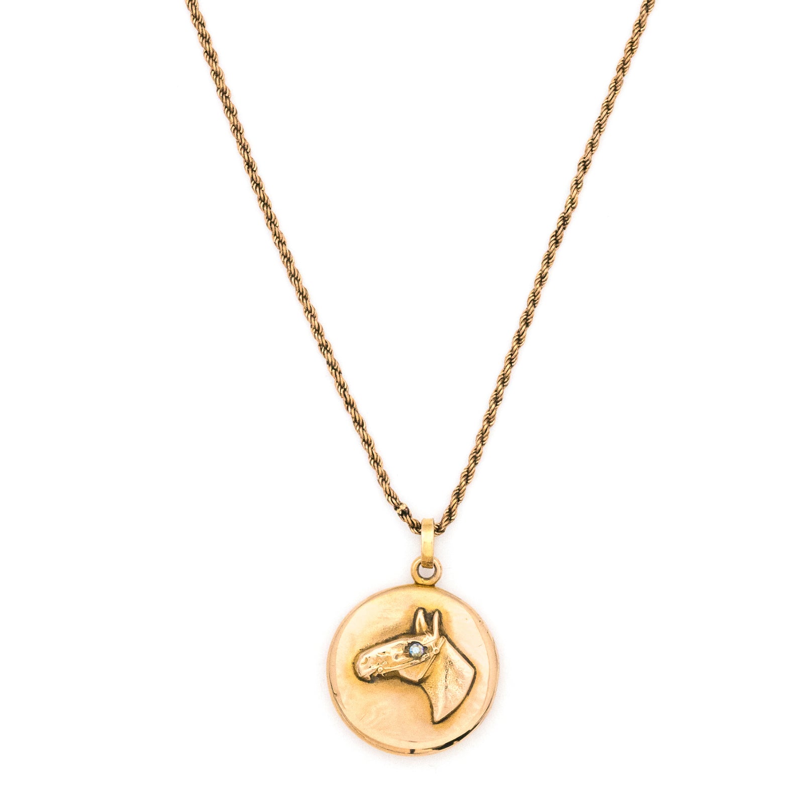 10K Gold Horse's Eye Antique Locket, lustrous 10k gold locket with opal for horses eye, perfect for holding pictures or photos, front view
