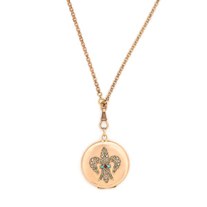 Turquoise & Pearl Fleur De Lis Antique Locket, gold fill locket perfect for holding pictures and photos, front view, shown on antique gold fill watch chain