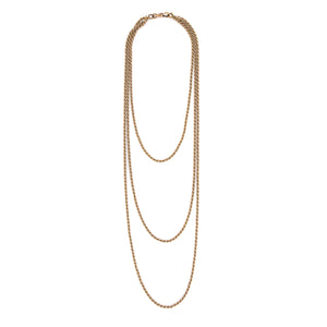 This 12K gold fill antique rope chain features three gorgeous strands of varying lengths (18", 27" and 34")  which meet together at the back with a hefty watch chain hook. Wear this striking piece alone or layered with your favorite pieces for a bold statement. Full chain view