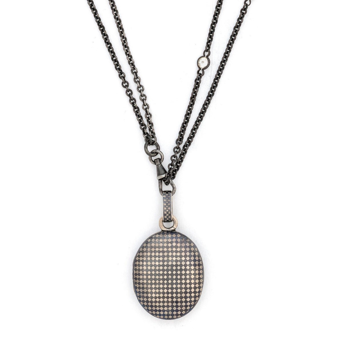 Checkered Oval Niello Antique Locket, black and white checker board locket, for holding pictures and photos, front view