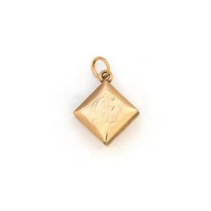 This square 10K gold locket features a simple Victorian starburst with turquoise at it's center and the letter G is inscribed on the back. It opens to hold two photos and pairs perfectly with one of our antique 14K gold chains.  Back Locket View