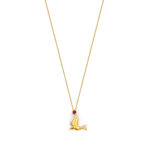 This playful seal charm is made of 10K Gold and features a genuine ruby as the ball on the tip of the seals nose and a diamond as the seal's eye. Paired with one of our antique 14K gold chains, this fun charm can be worn both alone as a pendant or in a cluster of charms. Front charm view shown on chain