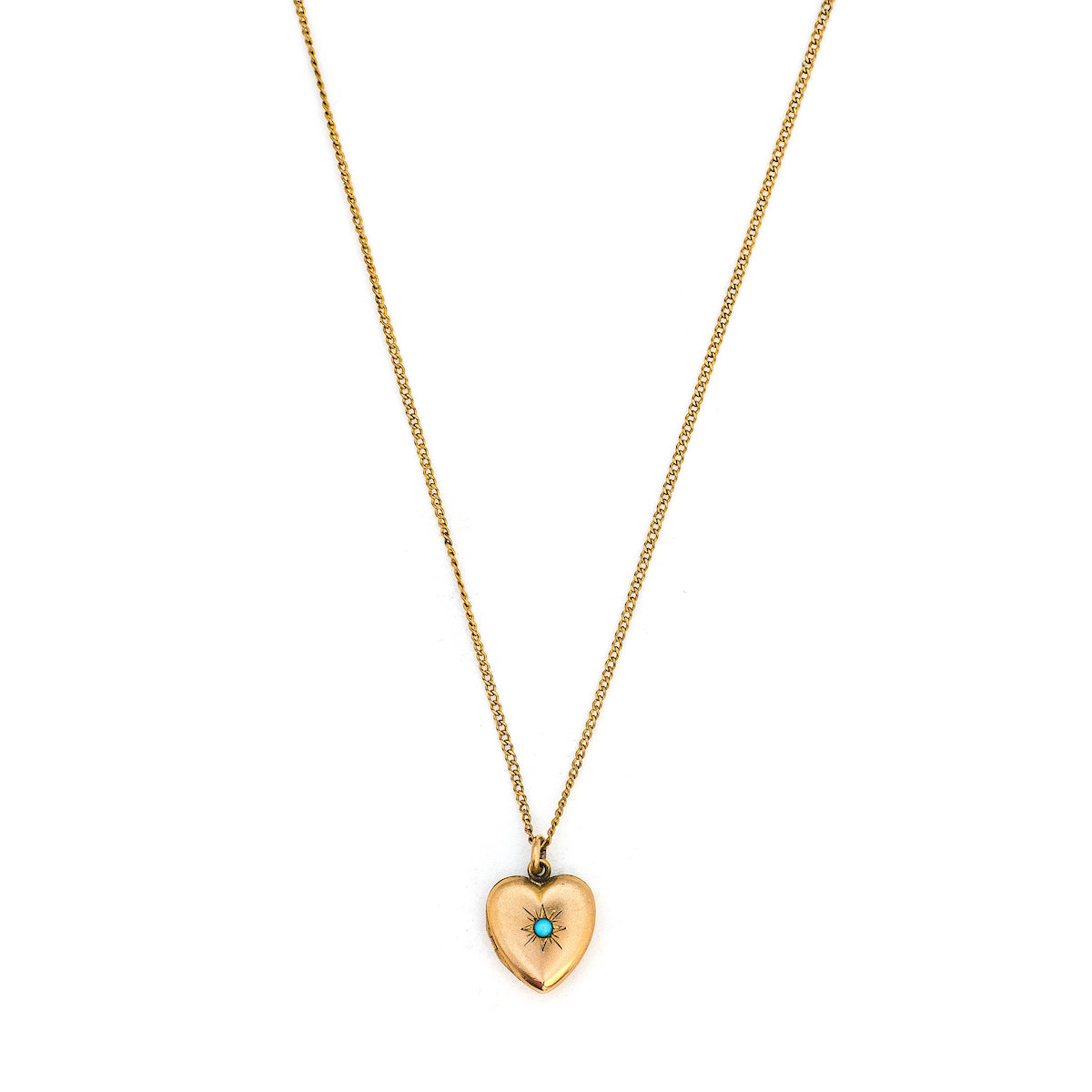 This petite heart shaped locket features a classic Victorian starburst with turquoise at it's center. It opens to hold two photos, includes both original frames and pairs perfectly with one of our antique gold fill chains. Front Locket View, shown on chain