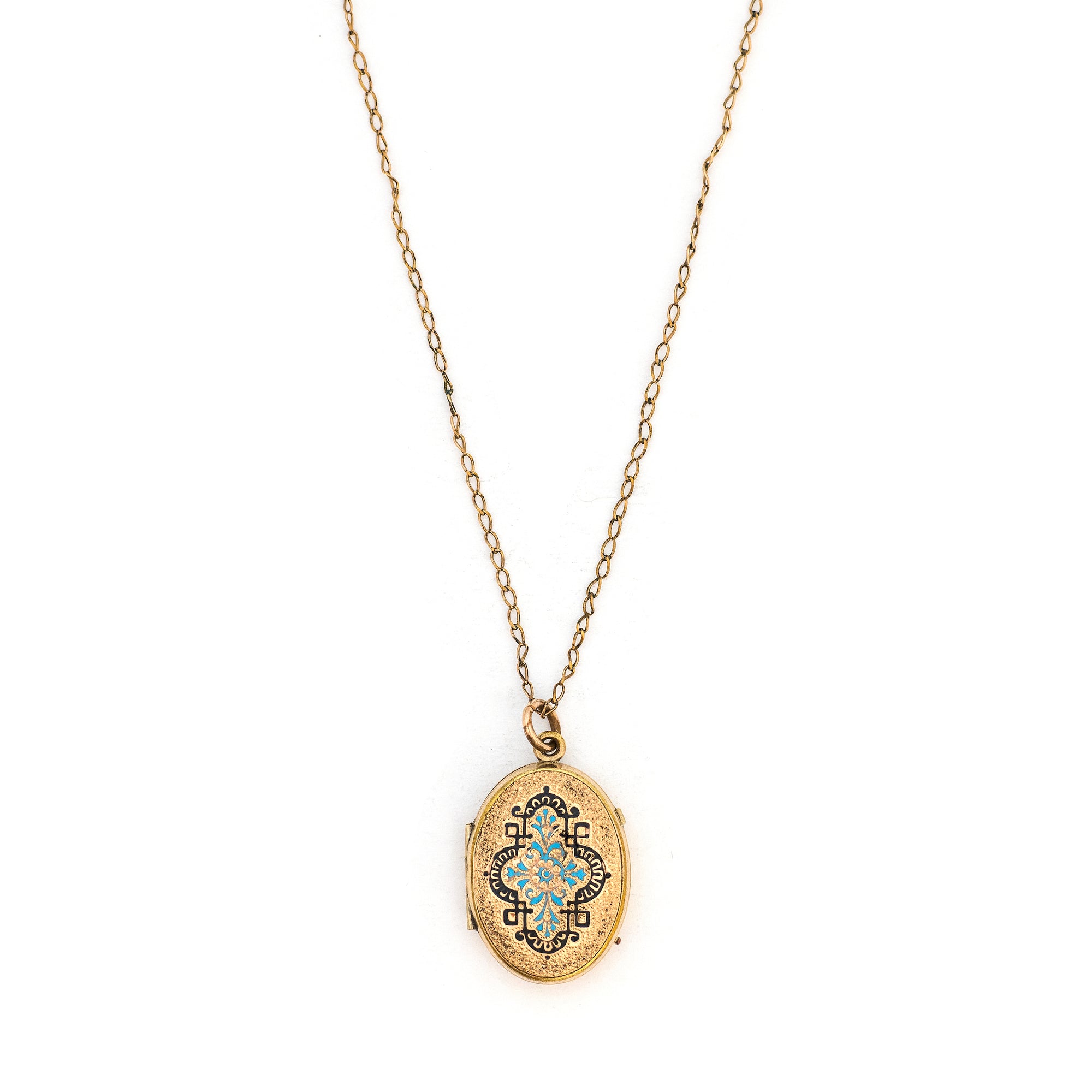This oval locket features a gorgeous light blue and black enamel design with a finely textured background. It opens to hold two photos and pairs perfectly with one of our antique gold fill chains.  Front Locket View