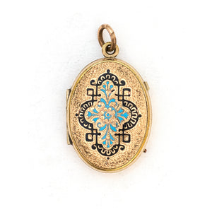 This oval locket features a gorgeous light blue and black enamel design with a finely textured background. It opens to hold two photos and pairs perfectly with one of our antique gold fill chains.  Front Locket View