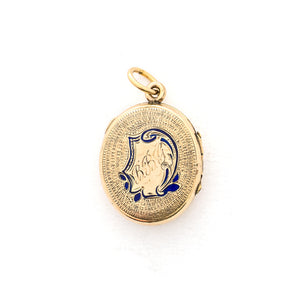 This sweet oval locket features a delicate rose design with navy blue enamel set on a finely textured background. The initials BBG are inscribed on the back. It opens to hold two photos, includes one original frame and glass and pairs perfectly with one of our antique gold fill chains.  Back locket view