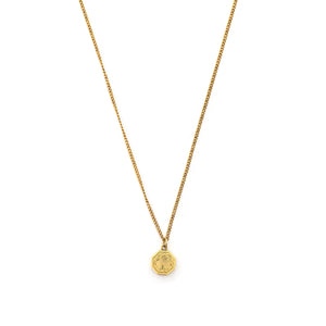 This petite octagonal locket features a delicately etched floral motif including a classic Victorian era symbol, the forget-me-not flower at the top of the design. It opens to hold two (very tiny!) photos and pairs perfectly with one of our antique gold fill chains.  Front locket view, shown on chain