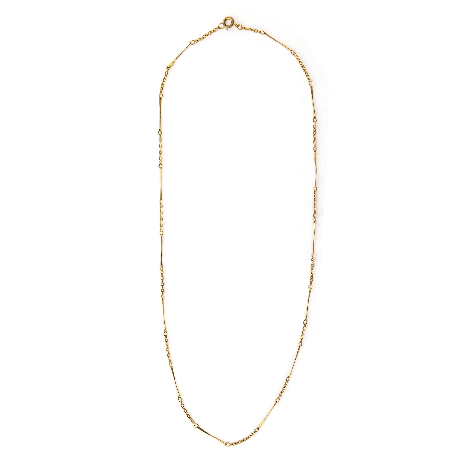 This gold fill vintage bar link chain features beautifully delicate bars and cable links in a pleasing pattern. Each bar has a slight twist which makes it even more eye catching. Wear this piece alone, with charms or a locket, or layered with other chains for a bold statement. Close up view