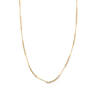 This gold fill vintage bar link chain features beautifully delicate bars and cable links in a pleasing pattern. Each bar has a slight twist which makes it even more eye catching. Wear this piece alone, with charms or a locket, or layered with other chains for a bold statement. Close up view