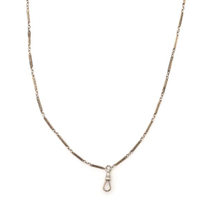 This classic sterling silver vintage bar link watch chain features silver bars that are beautifully engraved with curlicues and flourishes, on the front and back of each bar link. At 32", it pairs perfectly with one of our antique sterling silver or niello lockets. Close up view