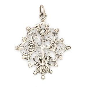 This grand sterling silver pendant features a cross surrounded by ornate vines.  Paired with our antique sterling silver bar link watch chain, this pendant can be worn both as a pendant or in a cluster of charms.  Front charm view