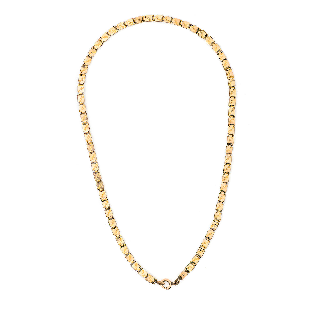 This 12K gold fill Victorian book chain features petite links with delicate etching on the front and back of each link. Measuring 15" long, wear this chain layered with other pieces or simply on its own. Full chain view