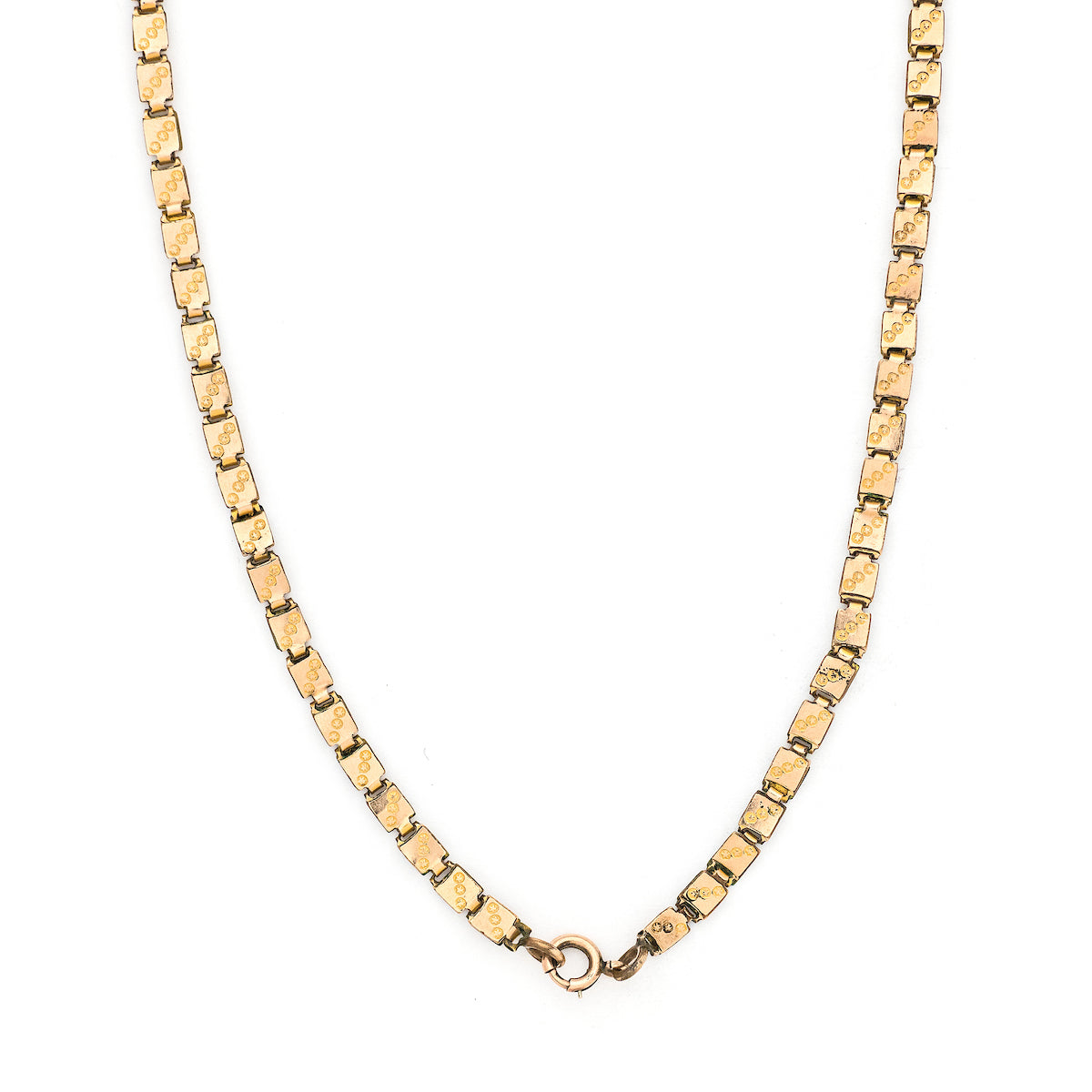 This 12K gold fill Victorian book chain features petite links with delicate etching on the front and back of each link. Measuring 15" long, wear this chain layered with other pieces or simply on its own. Full chain view